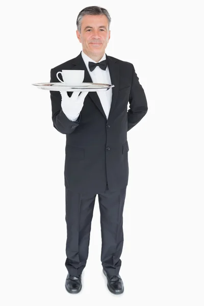 Waiter serving cup of coffee — Stock Photo, Image