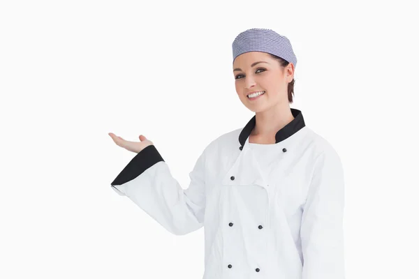 Happy chef showing something — Stock Photo, Image