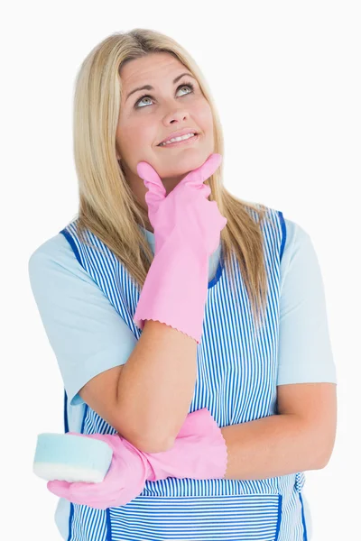 Cheerful cleaner thinking — Stock Photo, Image