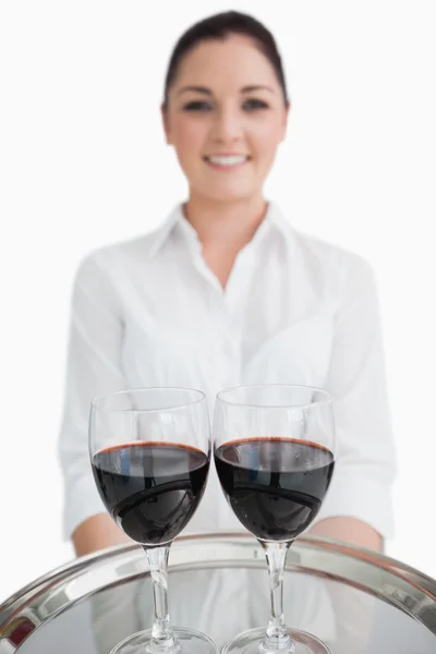 Close up of tray with glasses of wine Stock Photo