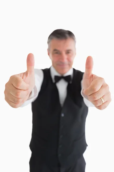 Smiling waiter having thumbs up — Stock Photo, Image