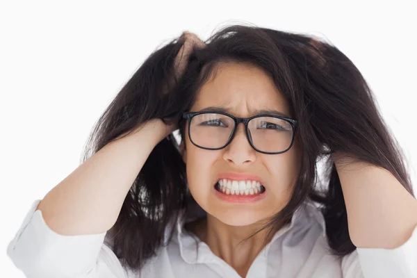 Worried woman putting her hand on the head — Stock Photo, Image