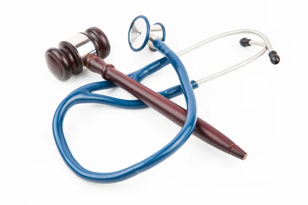 Blue stethoscope with gavel — Stock Photo, Image