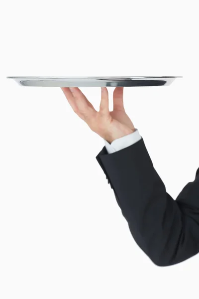 Well-dressed man holding silver tray — Stock Photo, Image