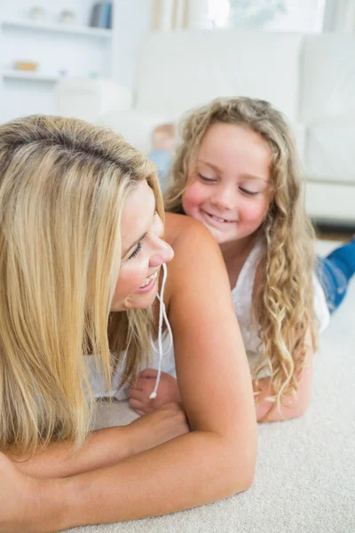 Daughter tickling her mother — Stock Photo, Image