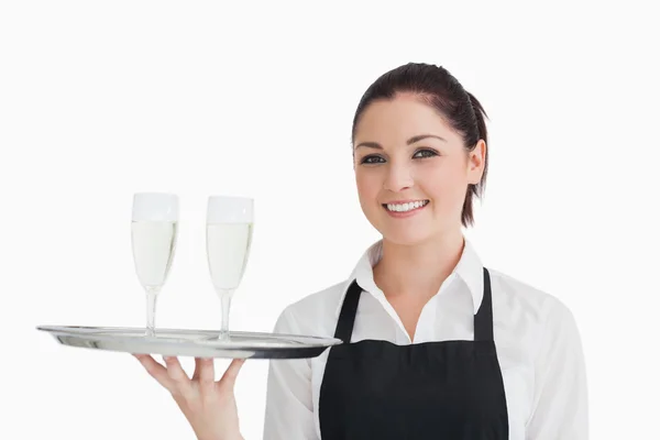 Waitress holding two glasses — Stock Photo, Image