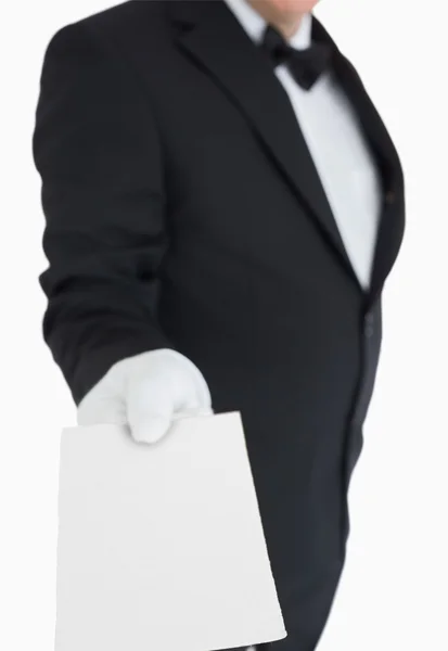 Waiter passing out a card — Stock Photo, Image