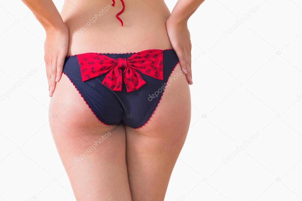 Woman at rear wearing bikini briefs Stock Photo by ©Wavebreakmedia 23492219