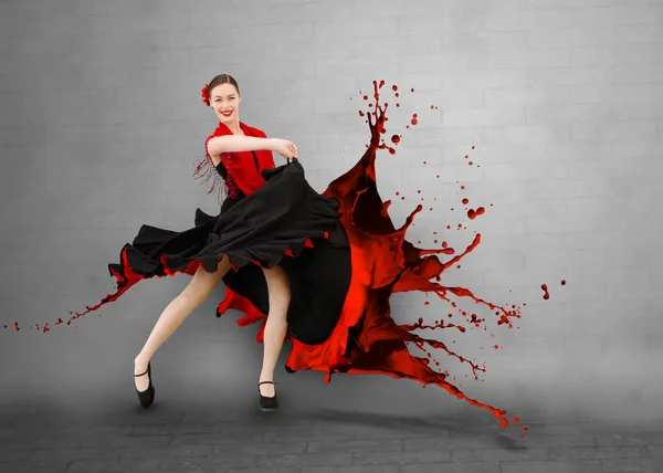 Flamenco dancer with dress turning into paint splashing — Stock Photo, Image