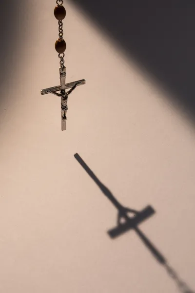 Crucifix casting a shadow — Stok Foto
