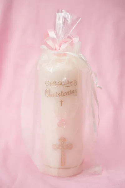 Christening candle wrapped up for a girl — Stock Photo, Image