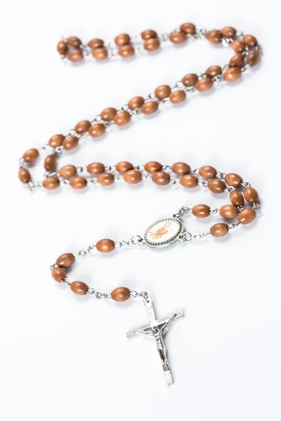 Wooden and silver rosary beads — Stock Photo, Image