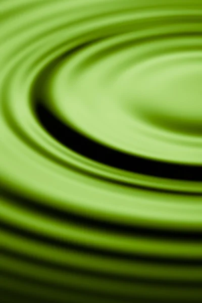 Зеленая рябь в воде — стоковое фото
