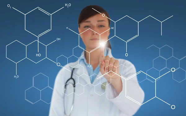 Practitioner using touchscreen displaying chemical formula — Stock Photo, Image