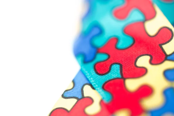 Close up van bewustzijn lint voor autisme — Stockfoto