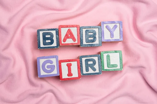Baby girl spelled out in blocks — Stock Photo, Image