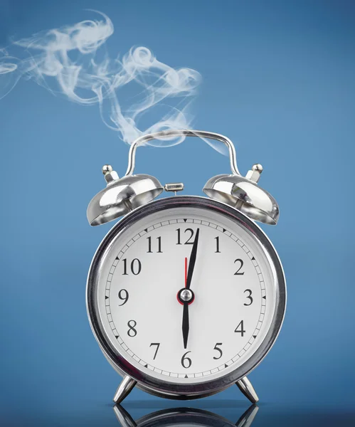 Smoking alarm clock — Stock Photo, Image