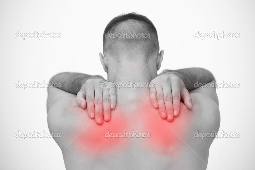 Man rubbing highlighted sore shoulders — Stock Photo © Wavebreakmedia