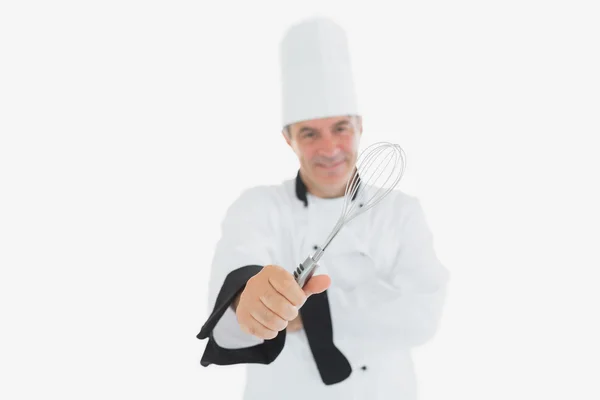 Mature chef holding wire whisk — Stock Photo, Image