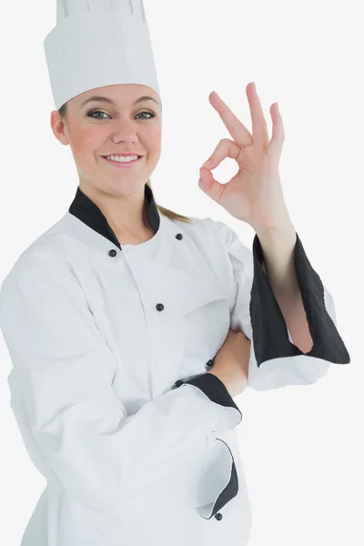 Happy female chef gesturing ok sign — Stock Photo, Image