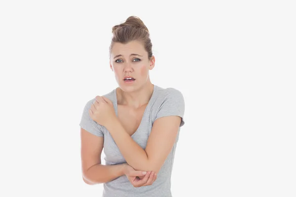 Young woman with elbow pain — Stock Photo, Image