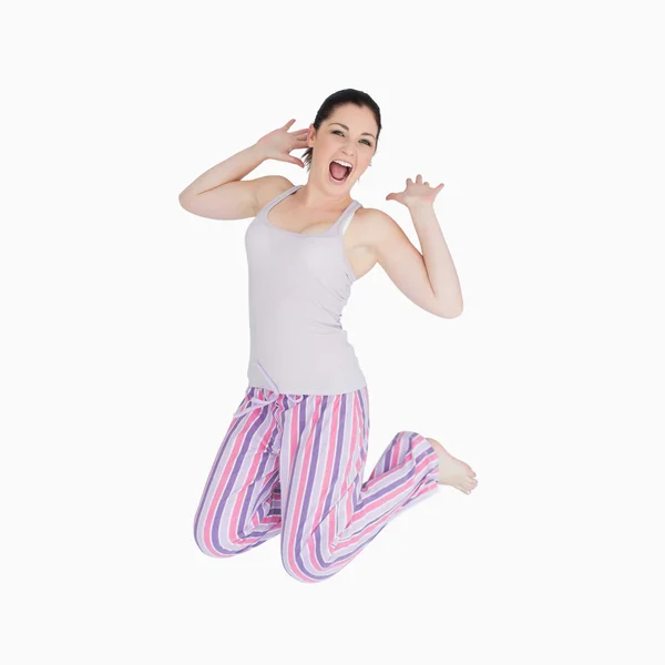 Gapende vrouw in pyjama — Stockfoto