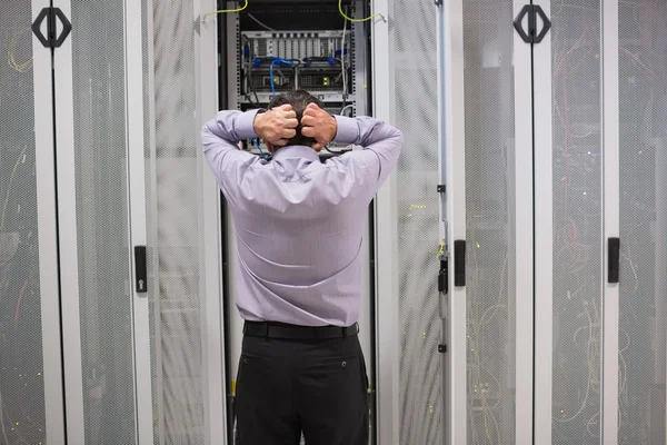 Technician getting stressed over server maintenance — Stock Photo, Image