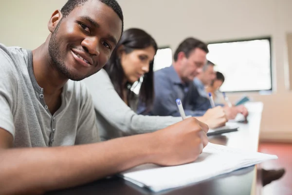 Man looking up from a lecture — Stock Photo, Image