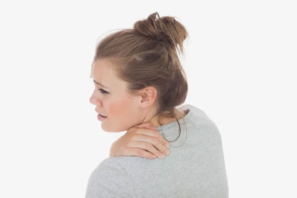 Young woman suffering from backache — Stock Photo, Image