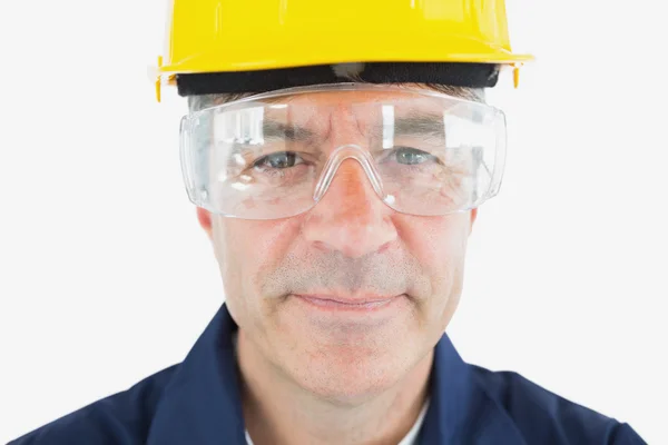 Mechanic wearing hardhat and protective glasses — Stock Photo, Image