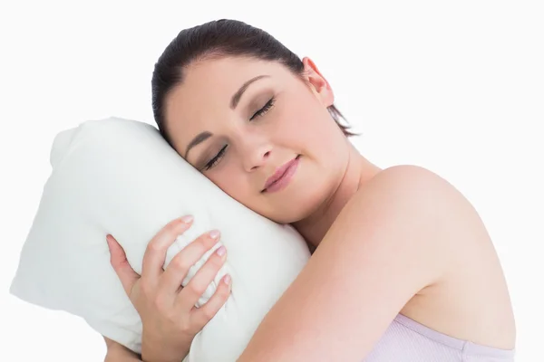 Женщина спит на подушке — стоковое фото