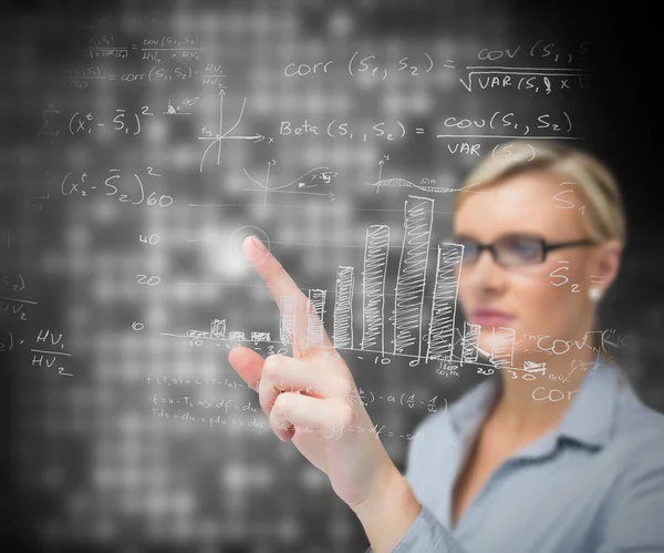 Businesswoman using patterns on touch screen — Stock Photo, Image