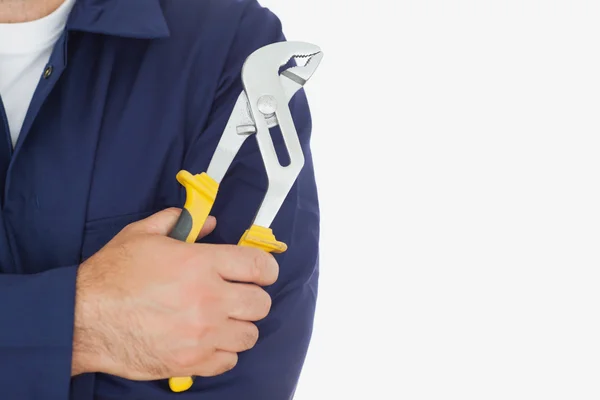 Mechanic holding pliers — Stock Photo, Image