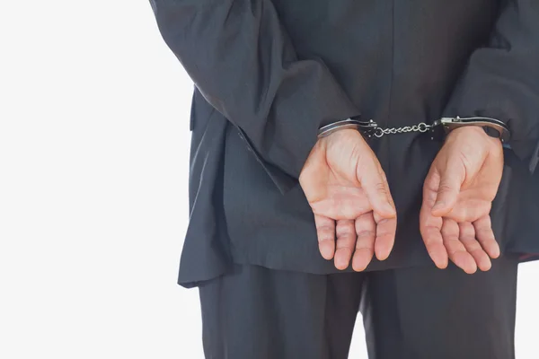 Businessman in handcuffs — Stock Photo, Image