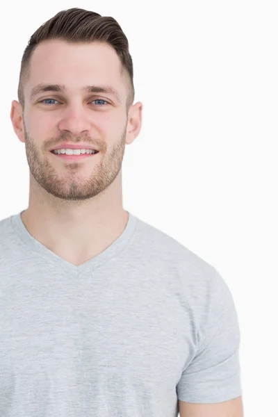 Close-up portrait of smiling young man — Stock Photo, Image