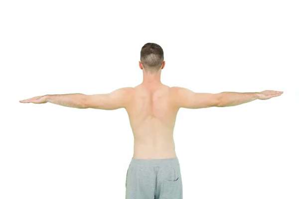 Rear view of young shirtless man — Stock Photo, Image