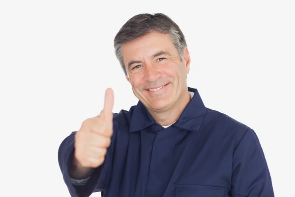 Mechanic showing thumbs up sign — Stock Photo, Image