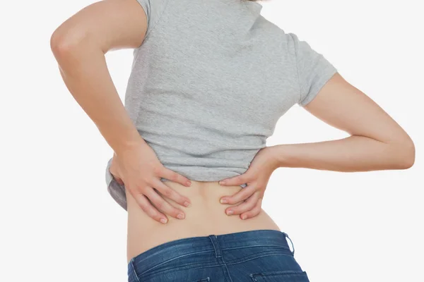 Achteraanzicht van vrouw met rugpijn — Stockfoto