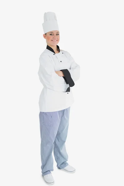 Vrouwelijke chef-kok met gekruiste armen — Stockfoto