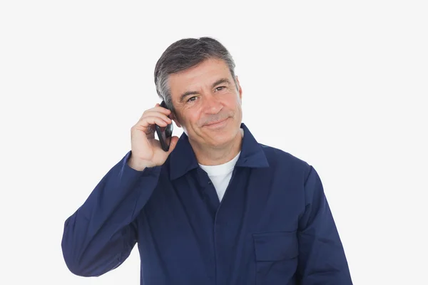 Mature mechanic on call — Stock Photo, Image