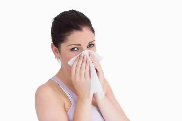 Sad woman blowing her nose — Stock Photo, Image