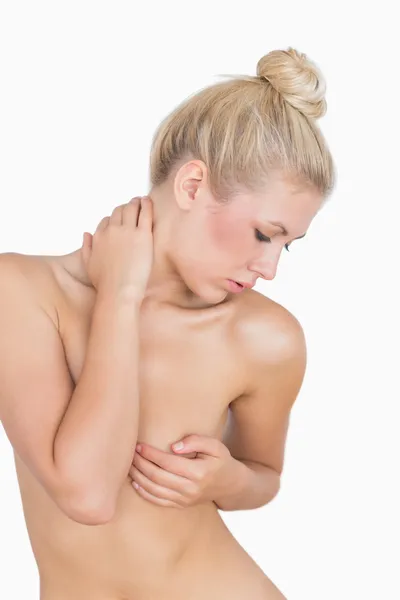 Topless woman covering her breasts — Stock Photo, Image