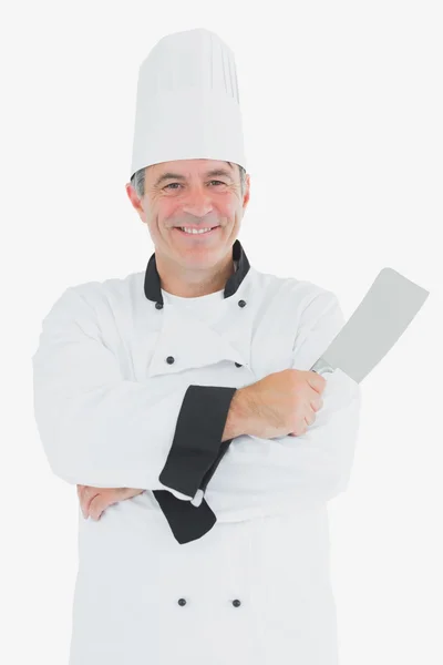 Happy chef holding meat cleaver — Stock Photo, Image