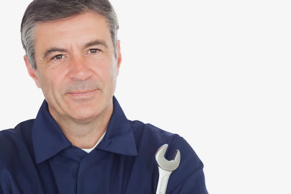 Portrait of mature machanic with wrench — Stock Photo, Image