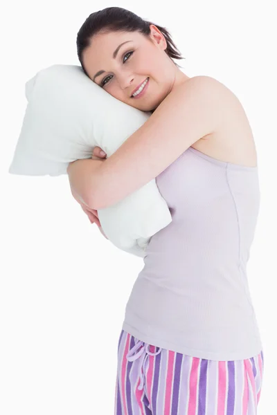 Pretty standing woman relaxing on her comfortable pillow — Stock Photo, Image