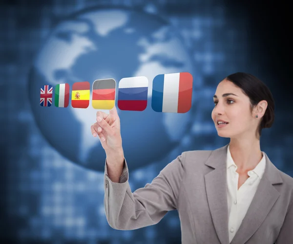 Empresaria eligiendo la bandera de Alemania — Foto de Stock