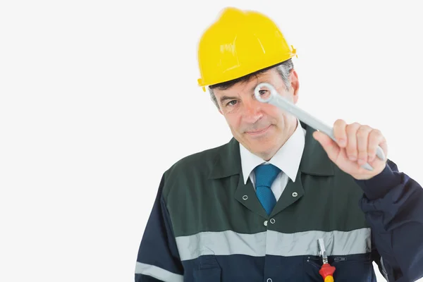 Repairman holding wrench — Stock Photo, Image