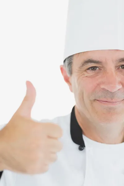 Imagen recortada de chef haciendo gestos pulgares hacia arriba —  Fotos de Stock