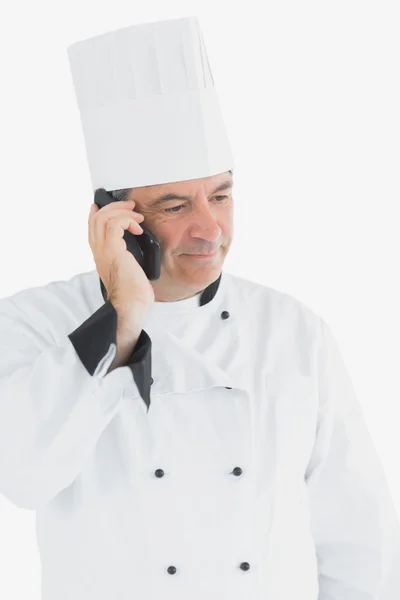 Férfi szakács használ sejt telefon — Stock Fotó
