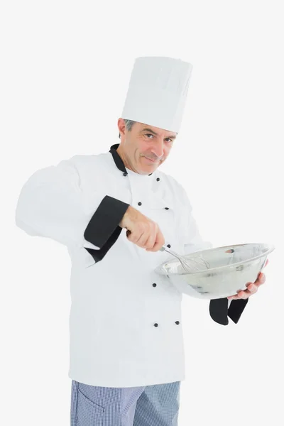 Chef mixing ingredients in bowl — Stock Photo, Image